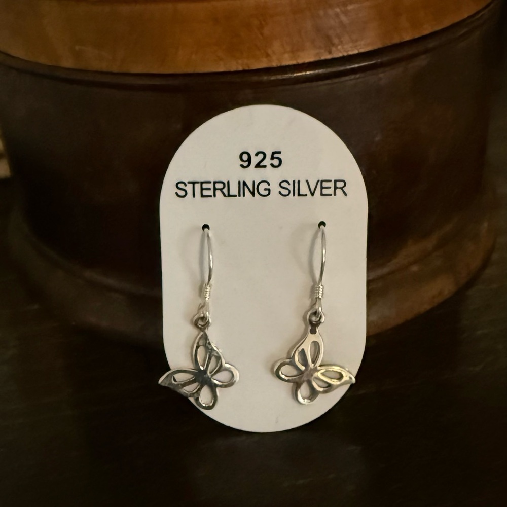 Beautiful 925 Sterling silver butterfly dangle earrings. New with tag.